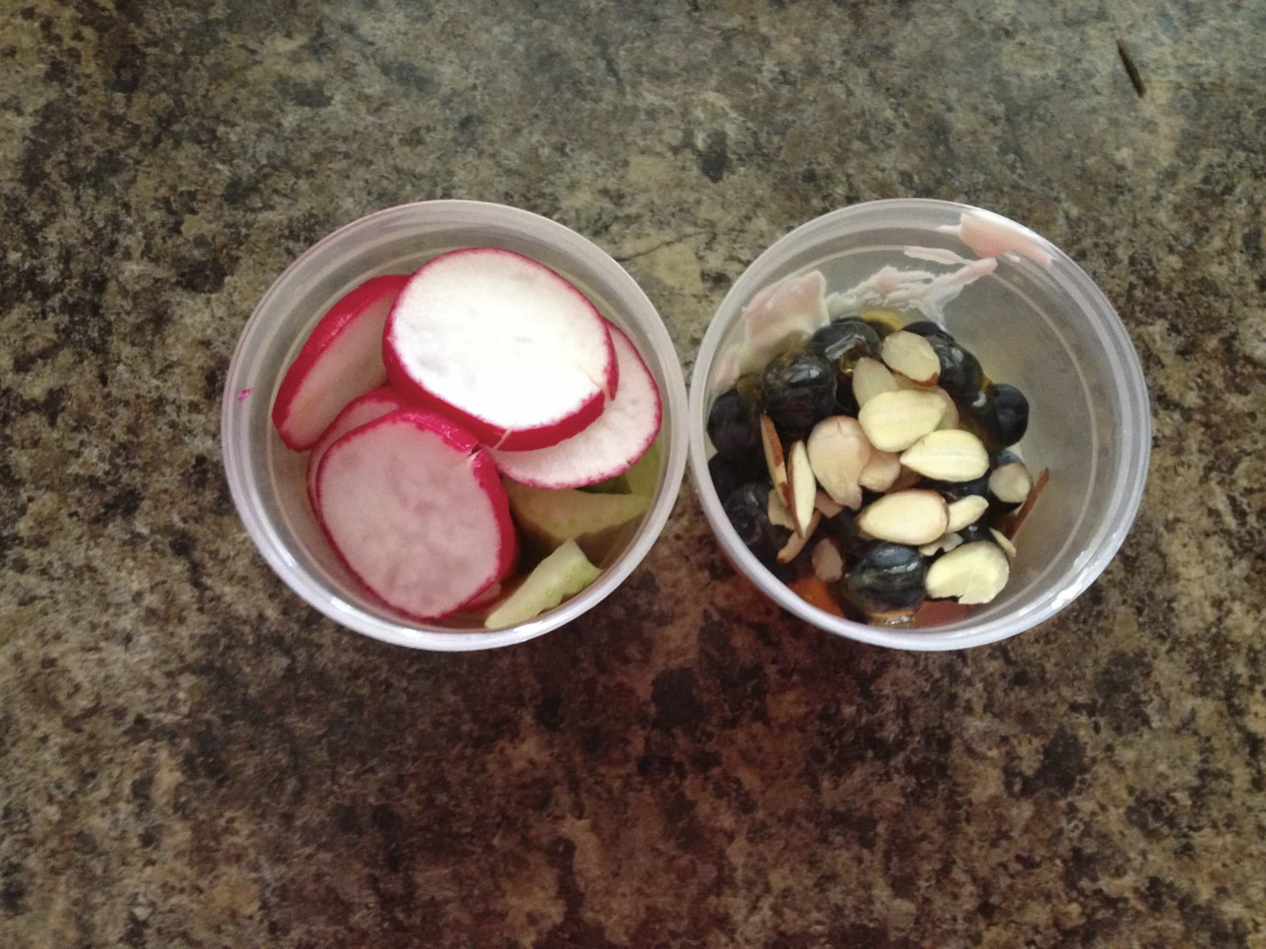 Lunch portion of vegetables and yogurt.