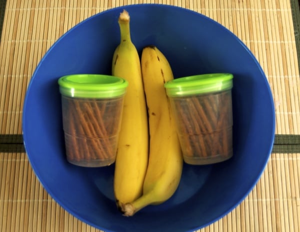 bananas and pretzels in a blue bowl