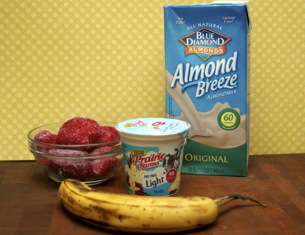 A strawberry banana smoothie recipe made with yogurt and almond milk. Healthy and kids love it!