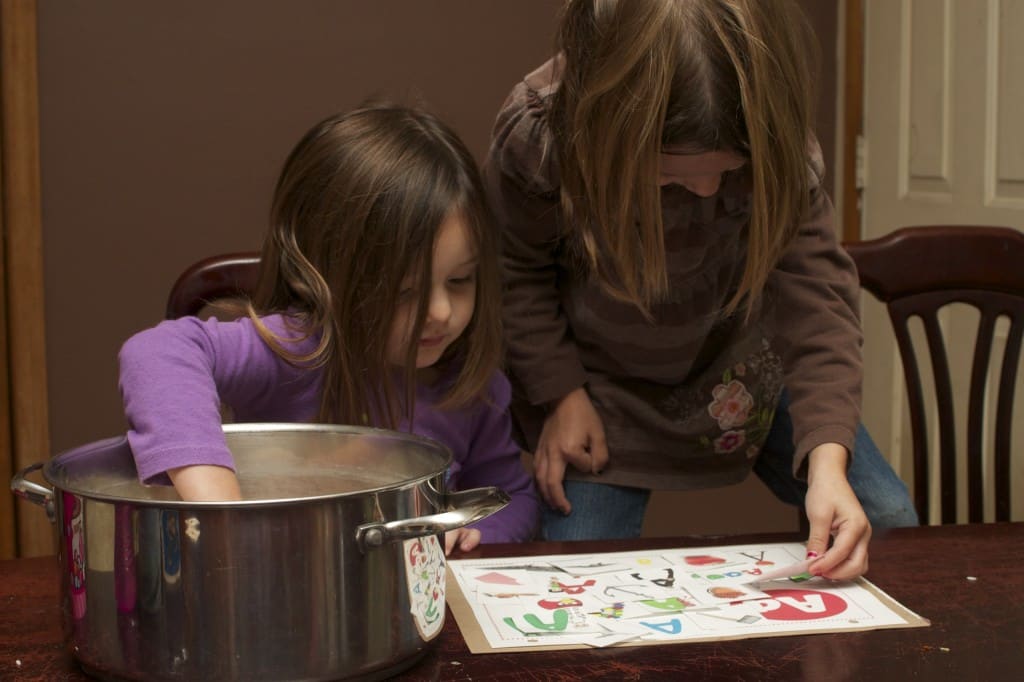 Preschoolers doing alphabet and sensory work. 