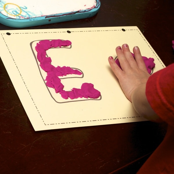 play-doh mat with the letter E