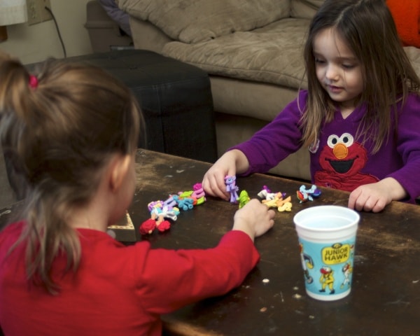 Girls playing with My Little Pony