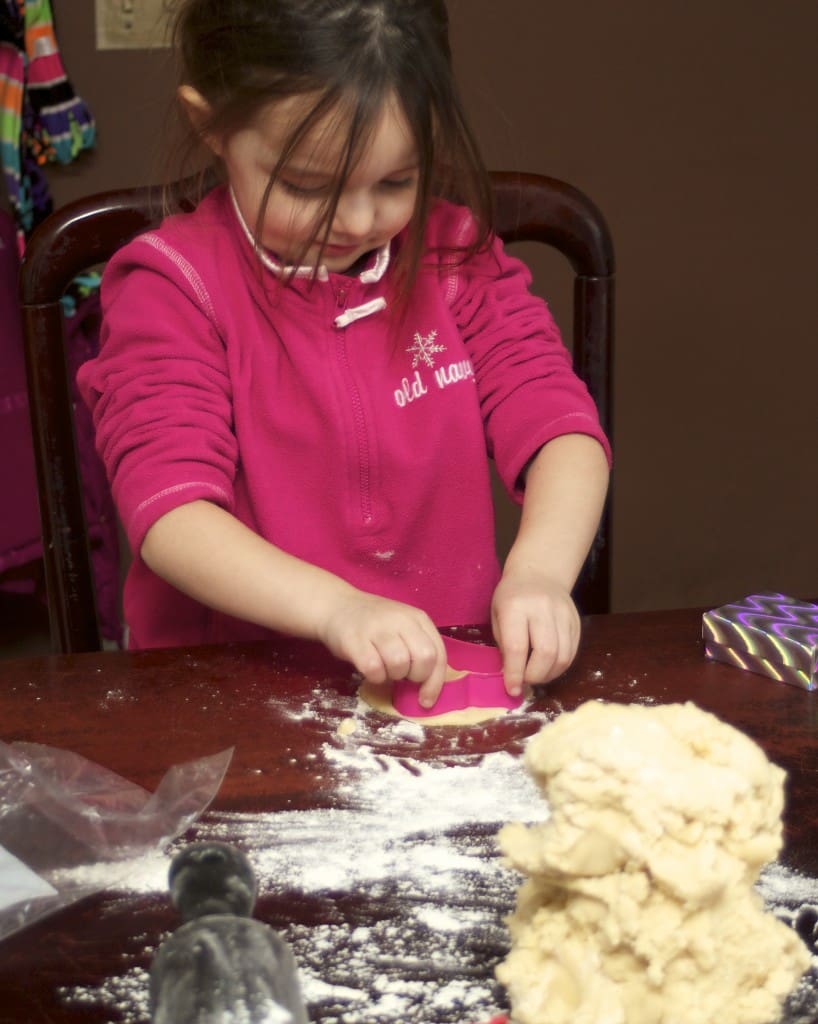 cutting out heart cookies