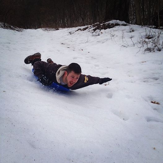 man sledding at Big Valley Ranch Avoca, WI