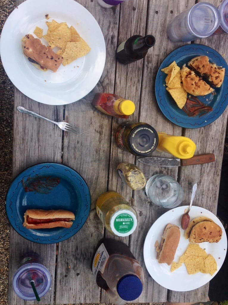 family dinner on a picnic table