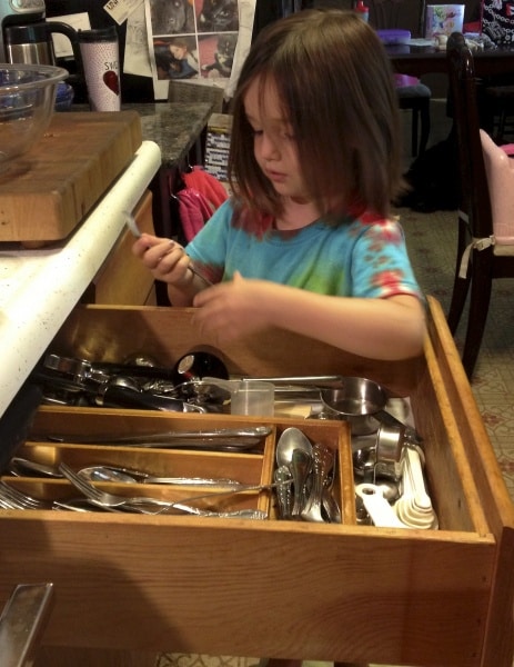 kids emptying the dishwasher