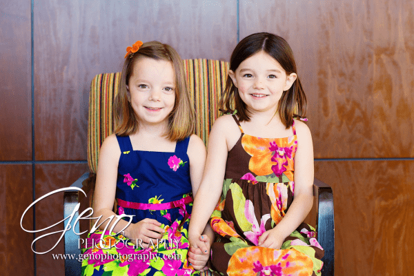 Harley and the Bear. Two sisters in spring dresses. 