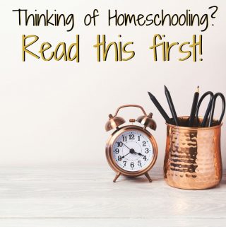 Should I homeschool featured image. Golden analog clock on a desk.