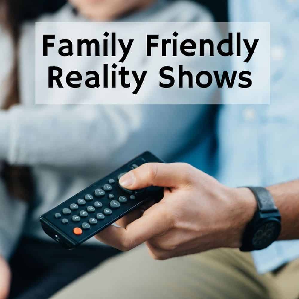 Close-up of Dad holding the remote and sitting with his family 