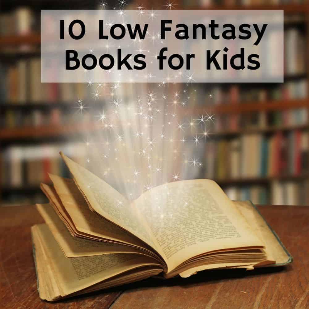 old book on a table glowing with stars | Title image of blog post 10 low fantasy books for kids