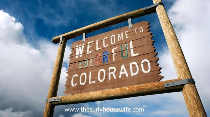 Welcome to Colorado sign. Title image to blog post 20 children's books about Colorado