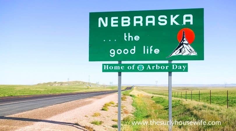 Welcome to Nebraska sign. Title image for blog post 20 children's books about Nebraska.